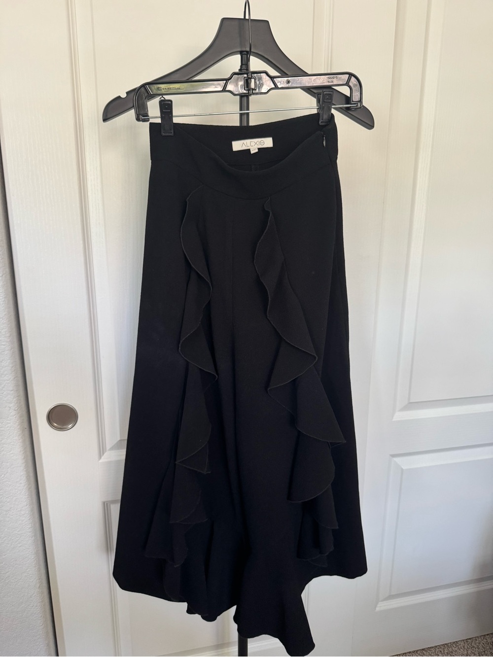 Alexis Black Wide-Leg Jumpsuit with Cascading Ruffle Panels